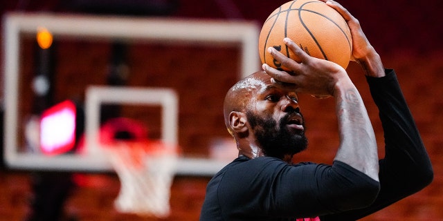 Miami Heat center Dwayne Dedman, #21, warms up before the game against the Oklahoma City Thunder at FTX Arena on January 10, 2023 in Miami.