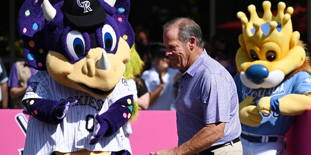 Rockies owner Dick Monfort celebrates the opening of Play Ball Park, an interactive baseball festival, at the Colorado Convention Center in Denver on July 9, 2021.