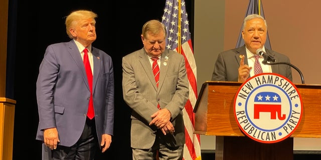 Former President Donald Trump (left) after his headline address at the annual meeting of the New Hampshire Republican Party in Salem, New Hampshire on January 28, 2023.  Trump is joined by outgoing NHGOP chairman Steve Stepanek (center), who joins Trump.  campaign as a senior adviser in New Hampshire and NRC committee member Chris Ager (right), who succeeded Stepanek as chairman