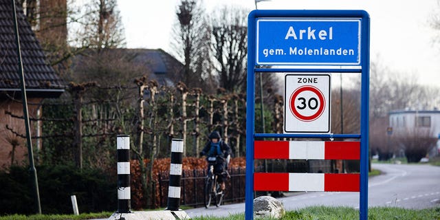 A road sign indicating the entrance of the southwestern Netherlands village of Arkel is pictured on Jan. 17, 2023 where Dutch police arrested a suspected security official from the Islamic State group suspected of links to war crimes in Syria, prosecutors said.