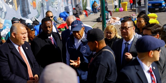 New York City Mayor Eric Adams stands outside a shelter during his visit to discuss immigration with local authorities in El Paso, Texas, on Jan. 15, 2023. 