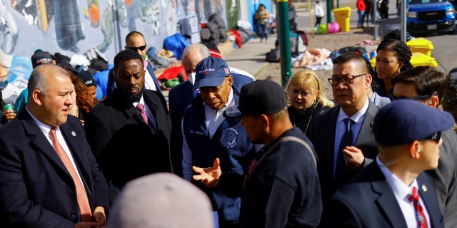 New York City Mayor Eric Adams stands outside a shelter during his visit to discuss immigration with local authorities in El Paso, Texas, on Jan. 15, 2023.