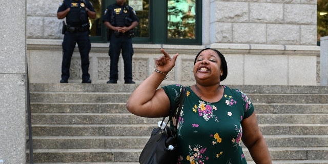 Eric Garner's daughter Emerald Snipes-Garner speaks to the press outside the Eastern District of New York July 16, 2019, after the decision by the U.S. Attorney's office. 