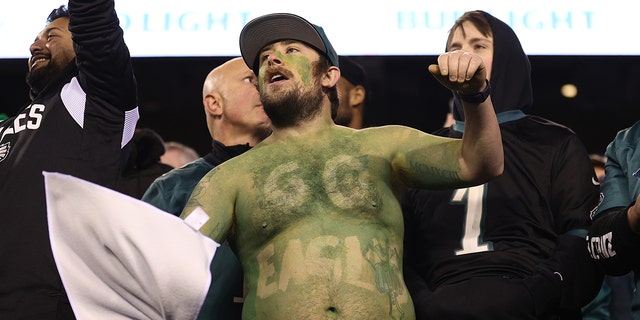 A Philadelphia Eagles fan celebrates in the NFC Championship Game at Lincoln Financial Field on Jan. 29, 2023, in Philadelphia.