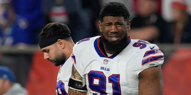 Ed Oliver of the Buffalo Bills reacts after teammate Damar Hamlin is tested during the first half of an NFL football game against the Cincinnati Bengals, Monday, Jan. 2, 2023, in Cincinnati.