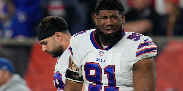 Ed Oliver of the Buffalo Bills reacts after teammate Damar Hamlin is tested during the first half of an NFL football game against the Cincinnati Bengals, Monday, Jan. 2, 2023, in Cincinnati.