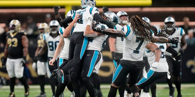 Carolina Panthers place kicker Eddy Pineiro celebrates with his teammates after kicking the winning field goal during the second half an NFL football game between the Carolina Panthers and the New Orleans Saints in New Orleans, Sunday, Jan. 8, 2023.