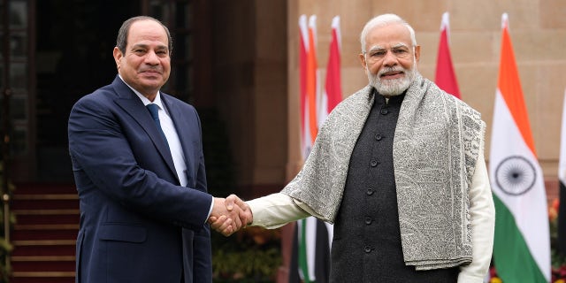 India's Prime Minister Narendra Modi, right, welcomes Egypt's President Abdel-Fattah El-Sisi as Chief Guest, in New Delhi, India, on Wednesday, Jan. 25, 2023 before India's annual Republic Day parade, Thursday. 