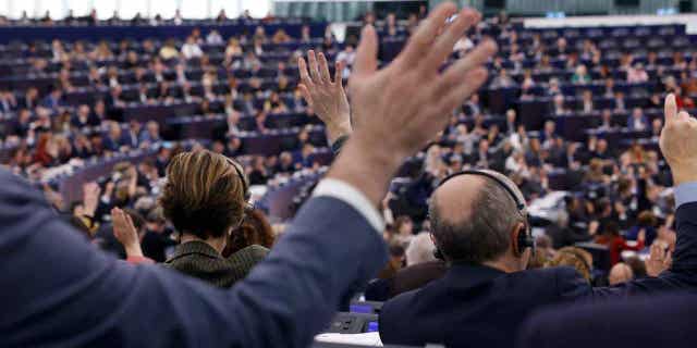 Members of the European Parliament vote on a new law to reform EU procedures at the European Parliament, on Jan. 17, 2023, in Strasbourg, France. The European Parliament wants the European Union to add Iran's Revolutionary Guard to its terrorist list.