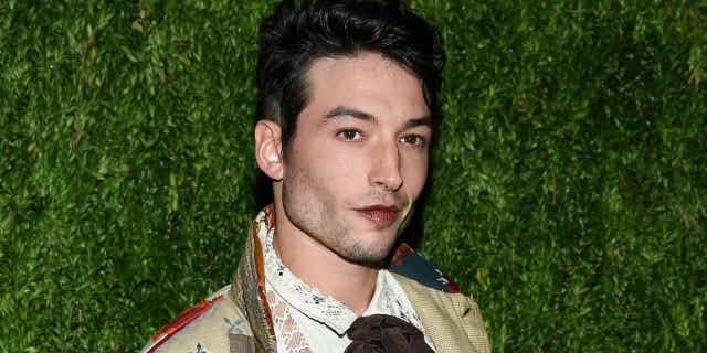 Ezra Miller attends the 15th annual CFDA/Vogue Fashion Fund event at the Brooklyn Navy Yard in New York on Nov. 5, 2018. (Photo by Evan Agostini/Invision/AP, File)