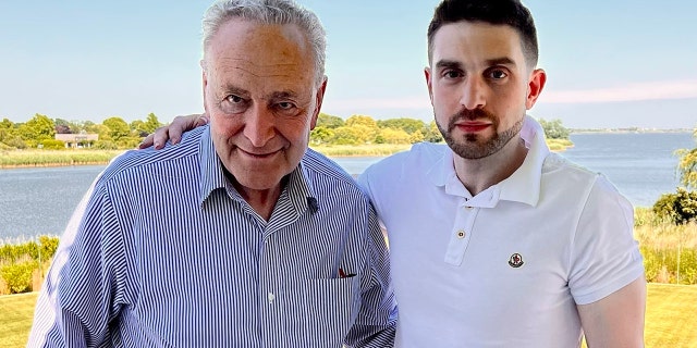 Senate Majority Leader Chuck Schumer of New York and Alex Soros, son of George Soros, take a picture together in an undisclosed location.