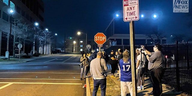 Fans hold a vigil outside University of Cincinnati Medical Center for injured Buffalo Bills safety Damar Hamlin.