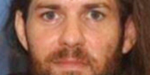 Benjamin Obadiah Foster is shown in this undated photo provided by the Grants Pass Police Department. Foster is accused of torturing a woman he held captive less than two years after he was convicted in Nevada of seriously injuring another woman he held captive for two weeks.