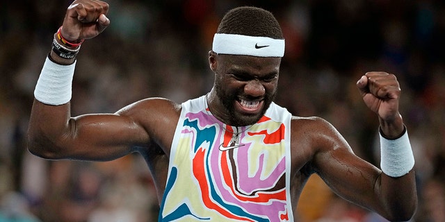 Frances Tiafoe celebrates after defeating Shang Juncheng in their second round match at the Australian Open in Melbourne, Wednesday, January 18, 2023.