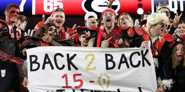 Georgia Bulldogs fans celebrate after defeating the TCU Horned Frogs in the College Football National Championship game at SoFi Stadium on January 9, 2023 in Inglewood, California.