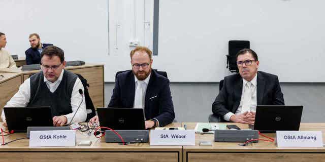 State prosecutors take their seats at the Higher Regional Court in Dresden, Germany, on Jan. 10, 2023, prior to a hearing in the trial over a jewelry heist on the Green Vault museum in Dresden's Royal Palace in November 2019. Four of the defendants in the trial have accepted deals which will reduce their punishment in exchange for confessions and the return of some of the haul.