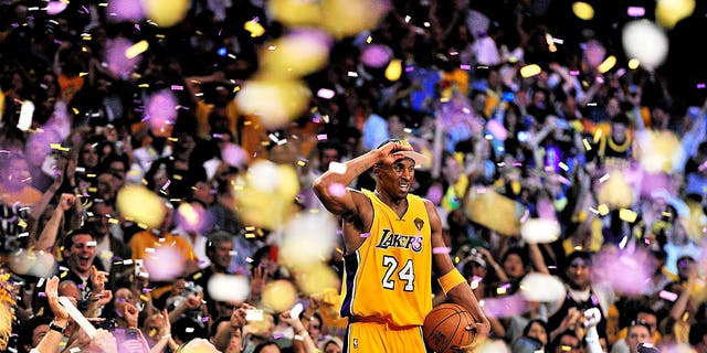 Los Angeles Lakers Kobe Bryant (24) victorious after winning championship vs Boston Celtics. 