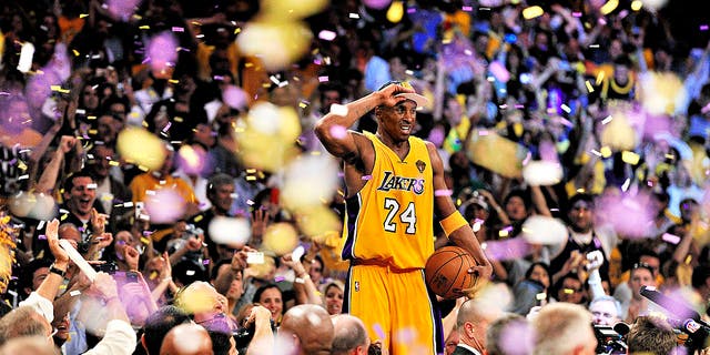 Los Angeles Lakers Kobe Bryant (24) victorious after winning championship vs Boston Celtics. 