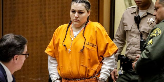 Heather Maxine Barron, who was indicted for the torture and murder of her 10-year-old son Anthony Avalos in Lancaster, walks into court for a pretrial hearing Feb. 27, 2018, in Los Angeles Criminal Court.