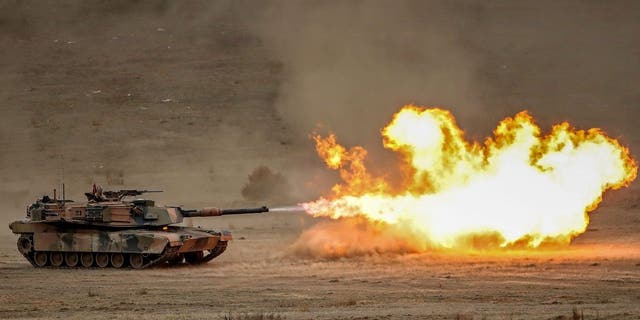 SEYMOUR, AUSTRALIA - MAY 09: A M1A1 Abrams main battle tank fires during Exercise Chong Ju at the Puckapunyal Military Area on May 09, 2019 in Seymour, Australia. 