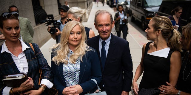 Virginia Giuffre (center) an alleged victim of Jeffrey Epstein, reached a settlement with the Duke of York.
