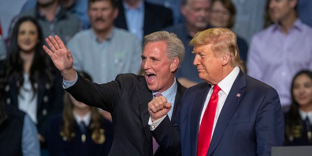 FILE - House Minority Leader Kevin McCarthy and US President Donald Trump attend a legislation signing rally with local farmers on February 19, 2020, in Bakersfield, California.
