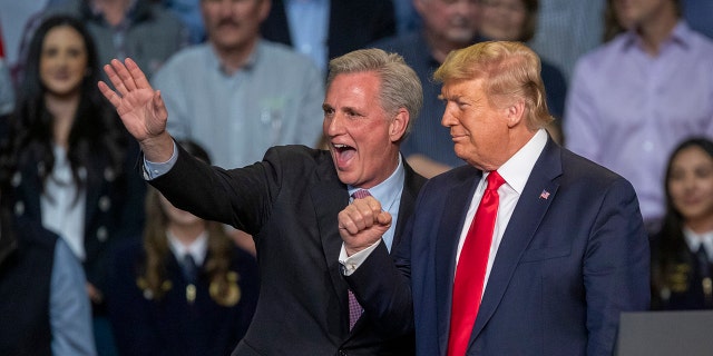 FILE - House Minority Leader Kevin McCarthy and US President Donald Trump attend a legislation signing rally with local farmers on February 19, 2020, in Bakersfield, California.