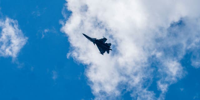 An Indian fighter plane flying in the sky toward Leh bordering China June 19, 2020, in Gagangir, India. 