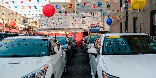 Cars for sale are shown at a dealership in Union City, New Jersey, on Friday, March 26, 2021.