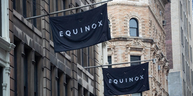 Signage outside an Equinox gym location in New York City on May 5, 2021. 