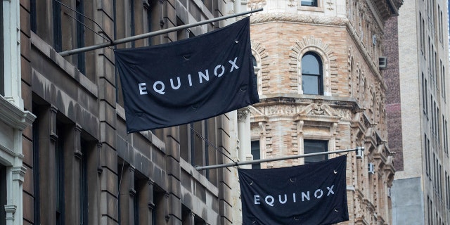 Signage outside an Equinox gym location in New York City on May 5, 2021. 