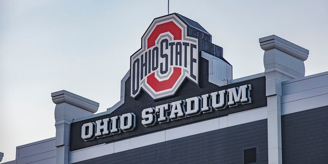 The Ohio State University logo at the top of the Ohio Stadium at sunset, during a summer day on The Ohio State University campus. 