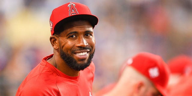 Los Angeles Angels outfielder Dexter Fowler in the dugout during a game against the Los Angeles Dodgers Aug. 6, 2021, at Dodger Stadium in Los Angeles. 