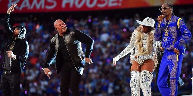 Eminem, L, Dr. Dre, M, Mary J. Blige, R, Snoop Dogg, far-R, perform during the halftime show of Super Bowl LVI between the Los Angeles Rams and the Cincinnati Bengals at SoFi Stadium in Inglewood, California, on February 13, 2022. 