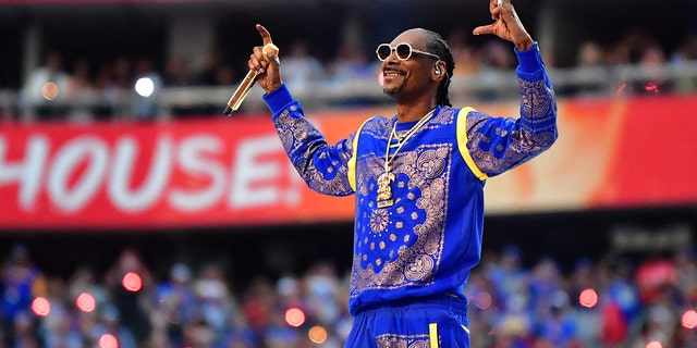 Snoop Dogg performs during the halftime show of Super Bowl LVI between the Los Angeles Rams and the Cincinnati Bengals at SoFi Stadium in Inglewood, California, on February 13, 2022. 