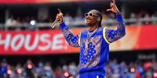 Snoop Dogg performs during the Super Bowl LVI halftime show between the Los Angeles Rams and Cincinnati Bengals at SoFi Stadium in Inglewood, California on February 13, 2022. 