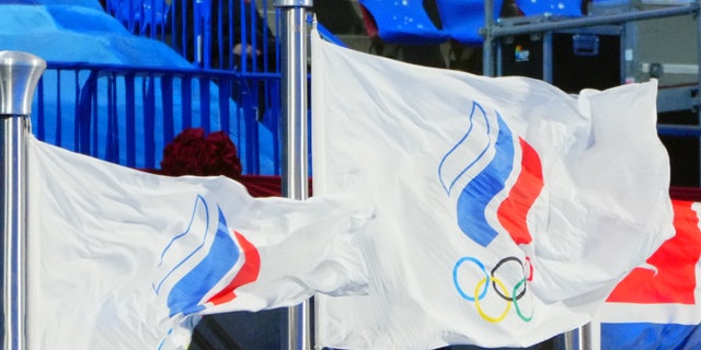 Closing ceremony of the 2022 Winter Olympics, at the Bird's Nest National Stadium. The Russian Olympic Committee flag flies in the stadium, Feb. 20, 2022.