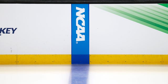 The NCAA logo on the blue line during a Frozen Four semifinal game between the Michigan Wolverines and the Denver Pioneers on April 7, 2022 at TD Garden in Boston. 