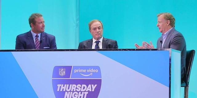 From left, Kirk Herbstreit, Al Michaels and NFL commissioner Roger Goodell speak on stage during Amazon Presentation At 2022 IAB NewFronts in New York City on May 2, 2022.