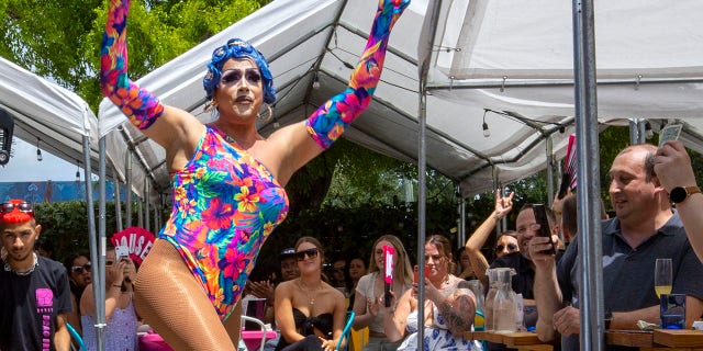 Host drag queen Athena Dion performs for guests during a Drag Brunch at R House Wynwood in Miami, Florida, on April 9, 2022. 