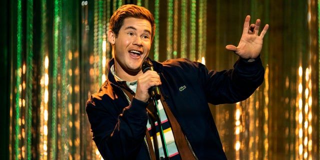 Adam DeVine acting during a performance. 