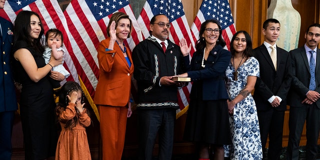 UNITED STATES - SEPTEMBER 13: Rep. Mary Peltola, D-Alaska, third from right, along with her family, participates in a swearing-in ceremony with Speaker of the House Nancy Pelosi, D-Calif., in the US Capitol on Tuesday , September 13, 2022. 