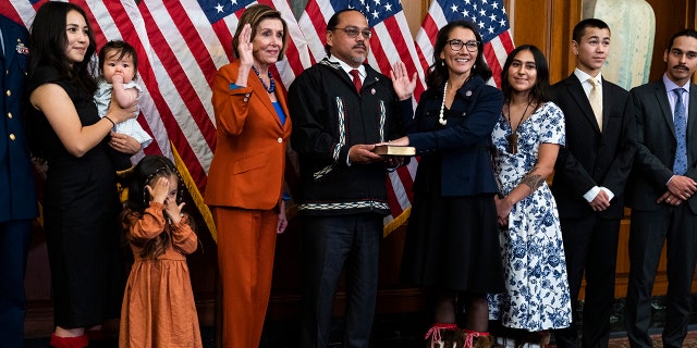 UNITED STATES - SEPTEMBER 13: Rep. Mary Peltola, D-Alaska, third from right, along with her family, participates in a swearing-in ceremony with Speaker of the House Nancy Pelosi, D-Calif., in the U.S. Capitol on Tuesday, September 13, 2022.