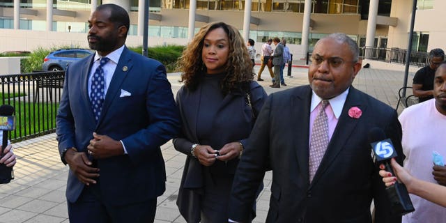 A. Scott Bolden, a former defense attorney for Marilyn Mosby, proclaims his client's innocence after leaving federal court with her and her husband, Nick Mosby, on Tuesday, Sept. 14, 2022, in Baltimore.