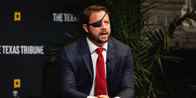 Representative Dan Crenshaw, a Republican from Houston, speaks in Austin, Texas, US, on Friday, Sept. 23, 2022. 