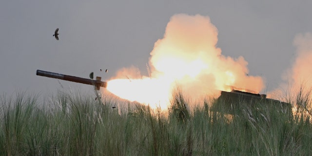 This photo shows the M142 High Mobility Artillery Rocket System firing during the Combined Arms Live Fire Exercise as part of the annual naval exercises between the Philippine Marine Corps and U.S. Marine Corps at Capas, Tarlac province on Oct. 13, 2022.