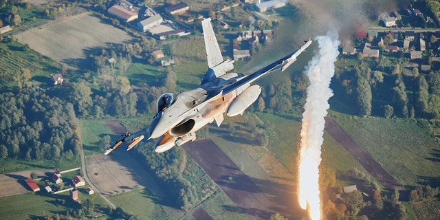 An F16 fighter jet takes part in a NATO air protection exercise near the air base in Lass, central Poland on October 12, 2022. 