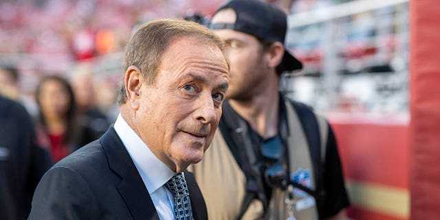 NBC commentator Al Michaels on the field during an NFL game between the San Francisco 49ers and Green Bay Packers in Santa Clara, Calif., Sunday, Nov. 24, 2019.