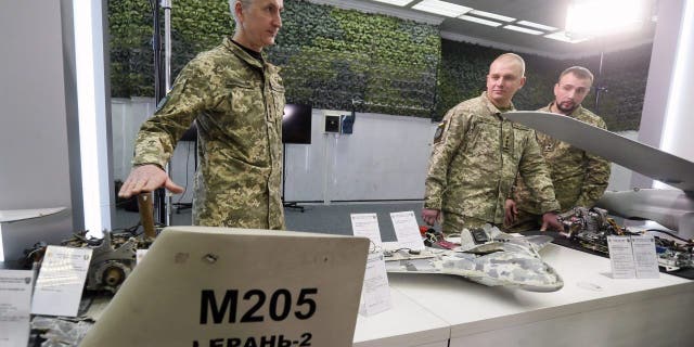 Parts of unmanned aerial vehicles Orlan-10, Granat-3, Shahed-136 and Eleron-3-SV, used by the Russia against Ukraine, are seen during a media briefing of the Security and Defense Forces of Ukraine in Kyiv, Ukraine on Dec. 15, 2022, amid Russian invasion of Ukraine. Security and Defense Forces of Ukraine representatives held a media briefing about situation on the Russian-Ukrainian war and the security situation in Ukraine. 