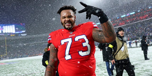 Dion Dawkins, #73 of the Buffalo Bills, celebrates after an NFL football game against the Miami Dolphins at Highmark Stadium on Dec. 17, 2022 in Orchard Park, New York. 